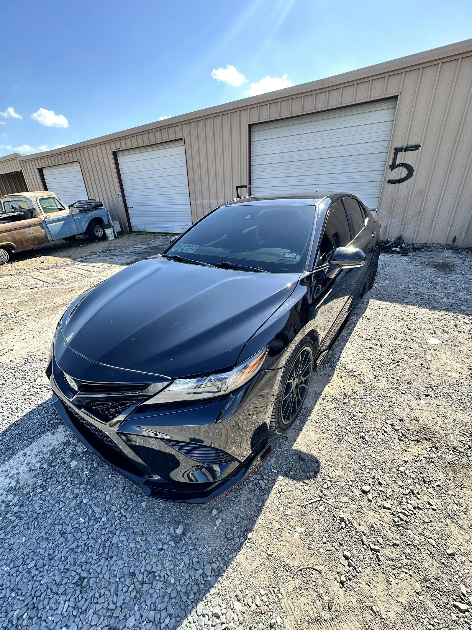 Black Toyota Camry tinted at Mr. Blessed Tint & Wrap